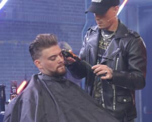 Cal Newsome on stage teaching. Cal will be on the live stage at HairCon.