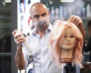 Andrew Barton on stage teaching. Andrew will be on the live stage at HairCon.