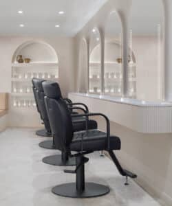 Comfortel Salon featuring four hair dressing chairs. Comfortel is one of the collaborators at HairCon