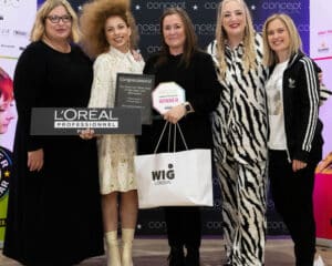 Concept Hair Learner of the Year awards with five women, one holding trophy. Creative Head learner of the year winners will be showcasing their talents on stage at HairCon.