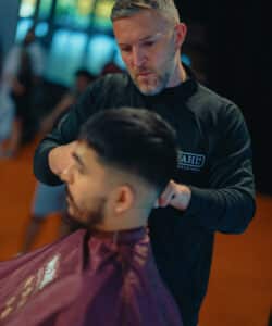 Alan Beak doing a demostration in partnership with Wahl. Wahl and their team will be live at HairCon.