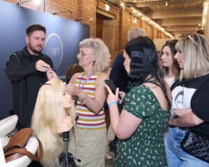 Demonstration on the Zen Hair Extension Stand at HairCon, Manchester 2024.